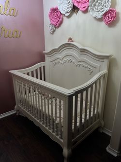 Unused baby crib and drawers
