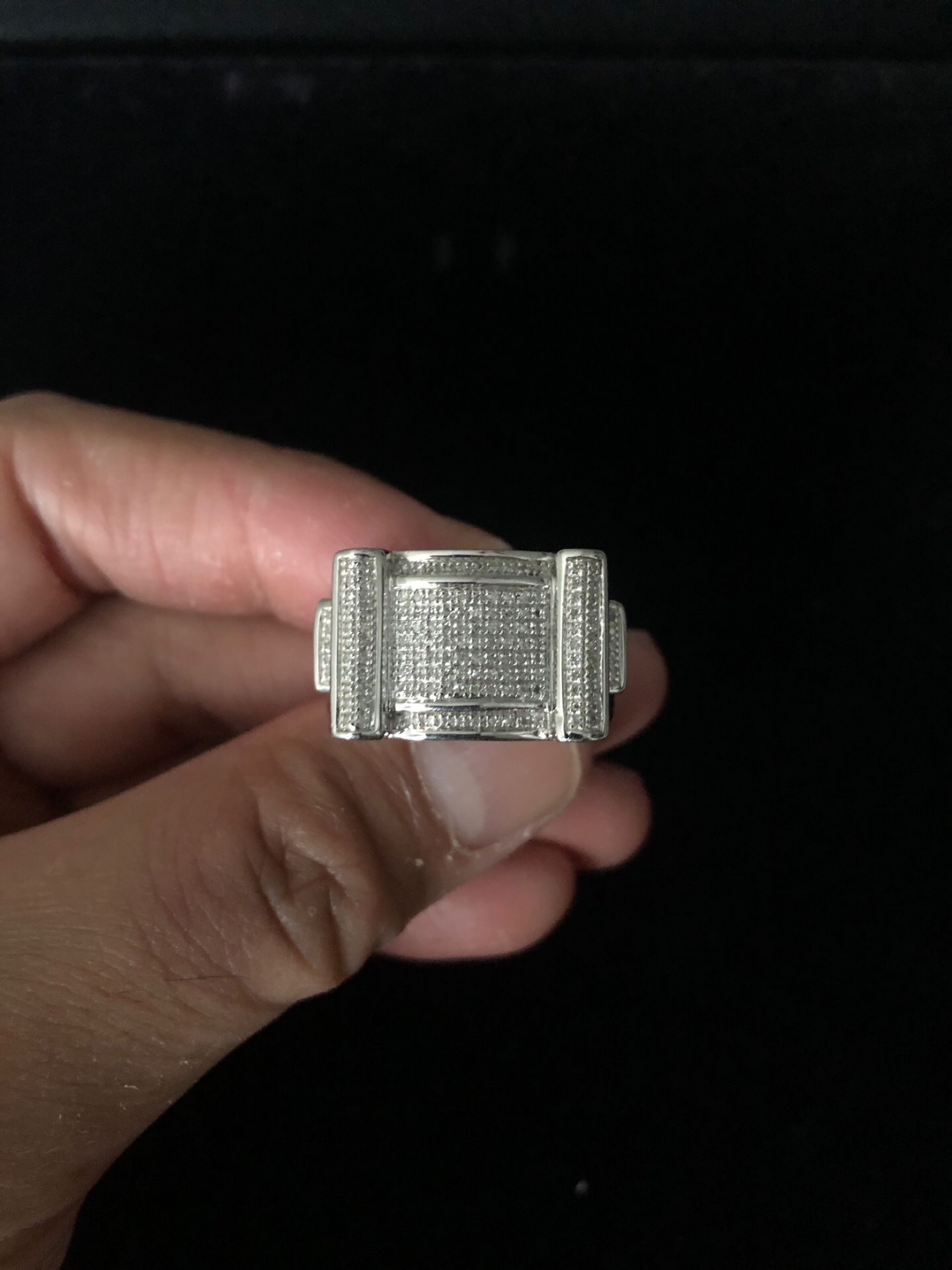 .925 silver genuine pavé diamond ring w/ white gold rhodium plating.