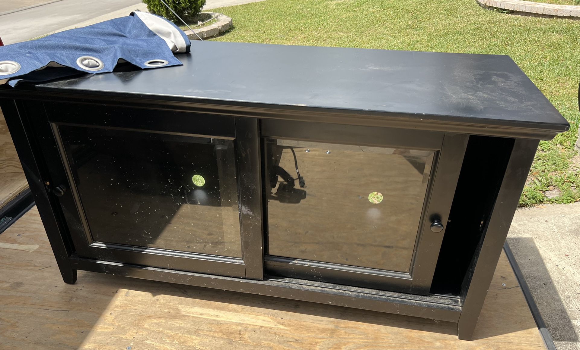 tv stand / entertainment center with glass doors 