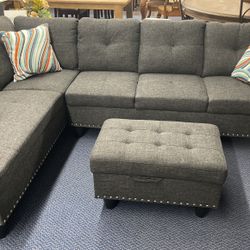 Dark Grey Color Sectional W/drop Cup Holder And Storage Ottoman