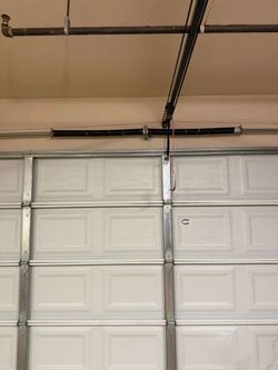Overhead Garage Door Opener Broken Spring Off Track Adjustment Replace And Parts