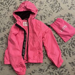 Justice pink raincoat size 8 with carrying pouch