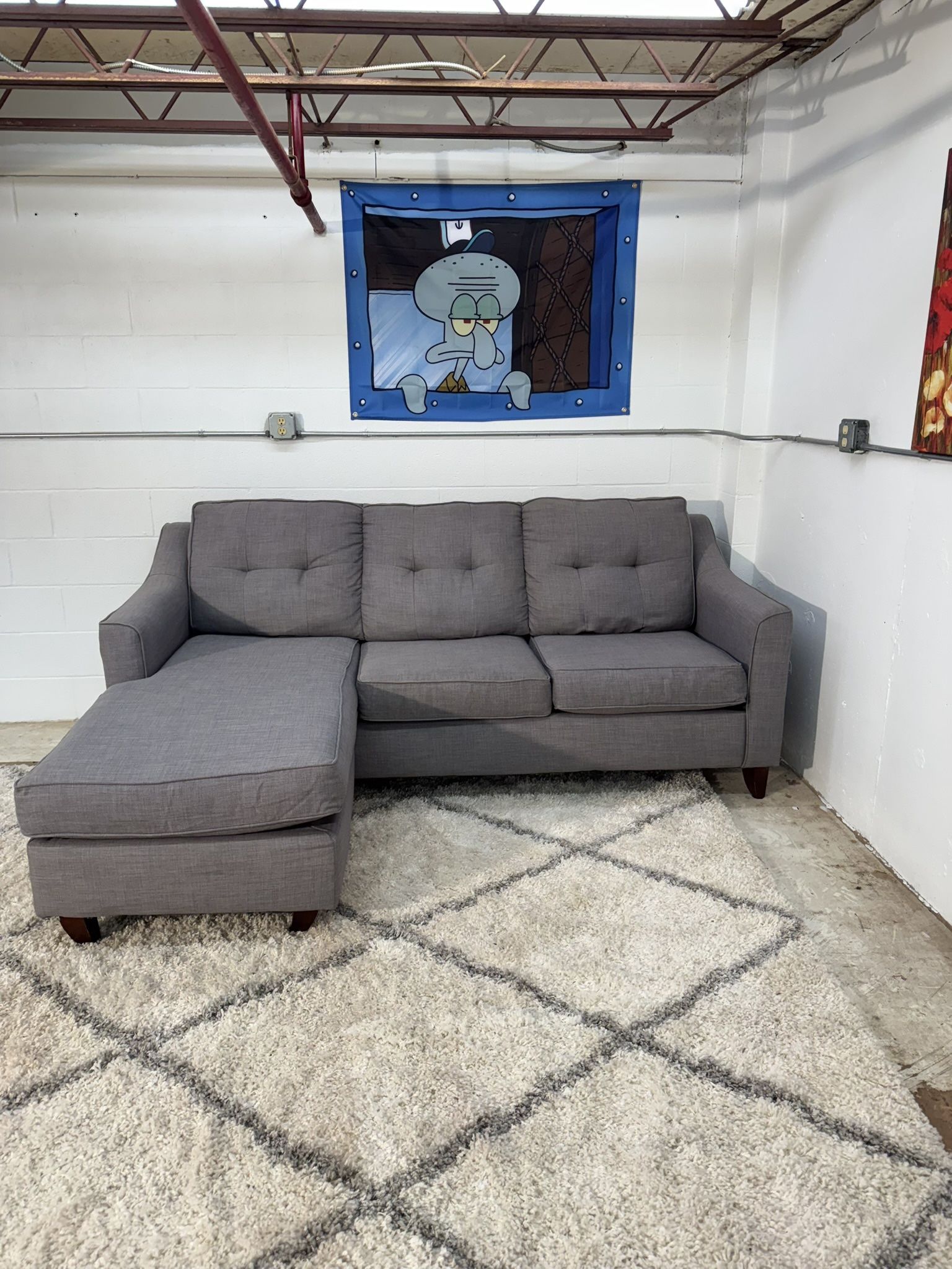 Grey Sectional and Free Chair