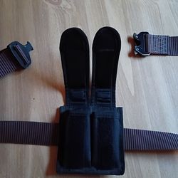 Tactical belt with storage pouch