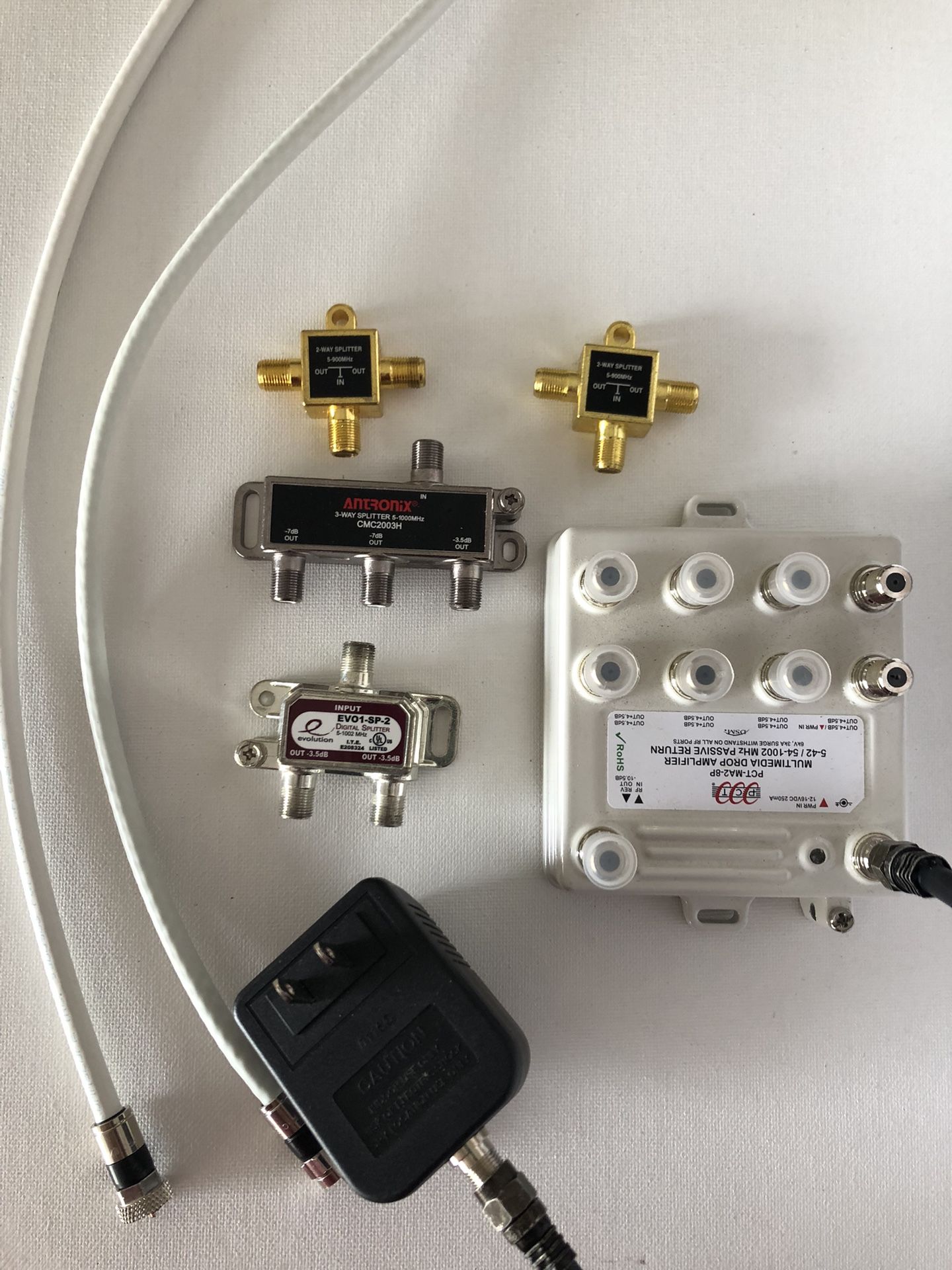 Cable TV Signal Amplifiers + Splitters