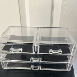 Clear jewelry organizer with three drawers 