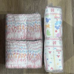 Huggies size 2 diapers ( Minnie , Mickey Mouse print )