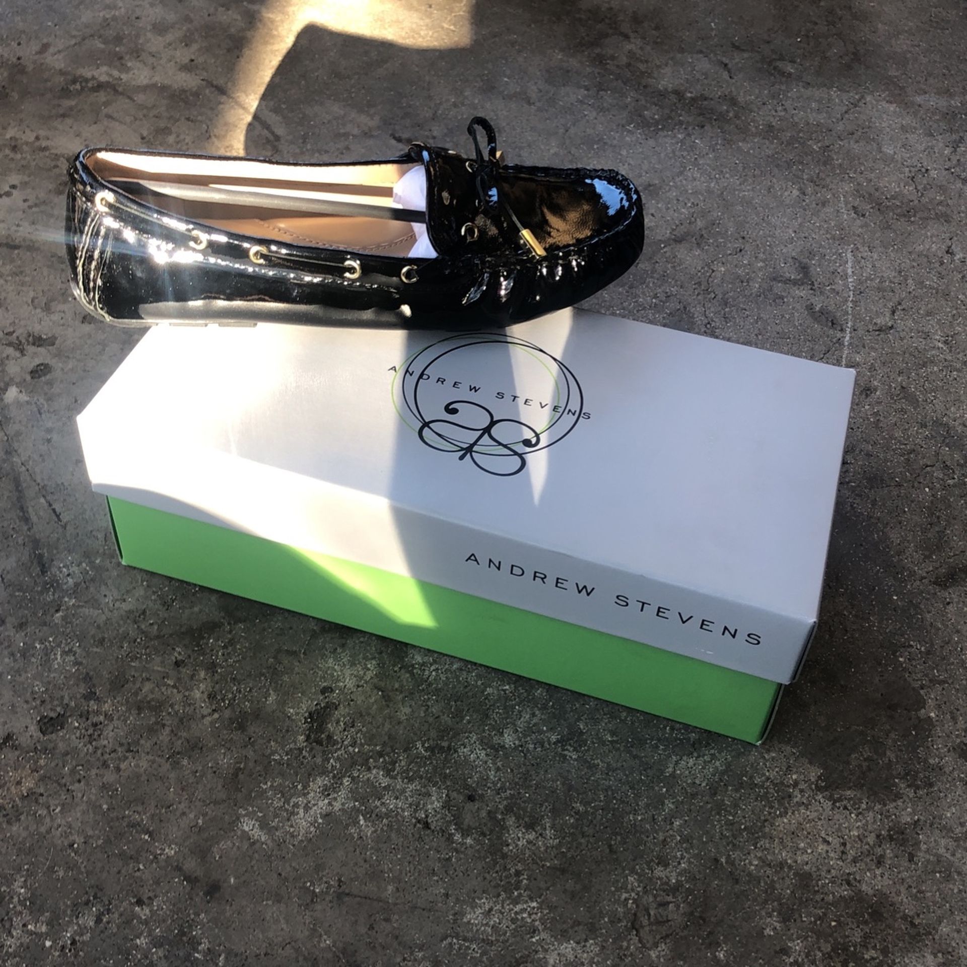 Andrew Stevens black slip-on shoes