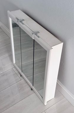 White Tri-Fold Mirrored Medicine Cabinet