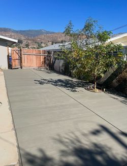 CEMENT-t CONCRETE-e DRIVEWAYy, SLAB-b. LANDSCAPE MOSH-h ROCK-k.