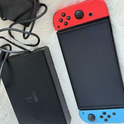 Nintendo Switch with Neon Blue and Neon Red Joy Con