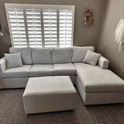 New Grey Sectional And Ottoman