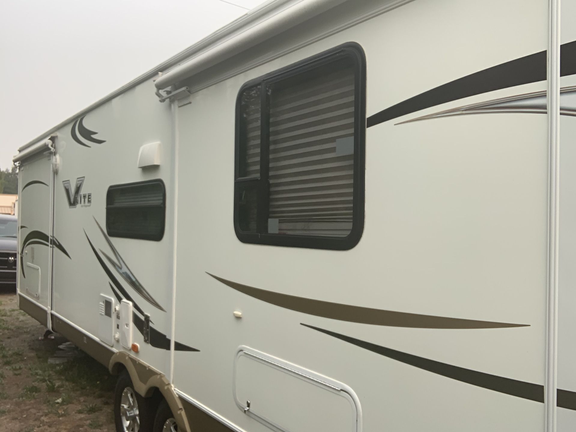 2012 V lite by Flagstaff travel trailer 30 ft (With 3 slide outs)