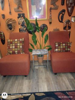 2 orange accent chairs