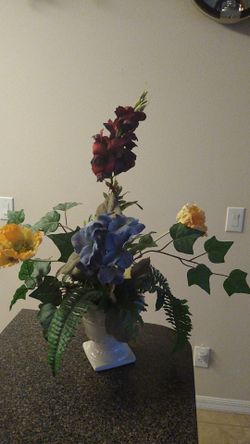 Flowered centerpiece 22" high in ceramic base