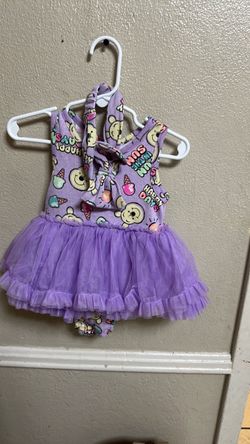 Winnie the Pooh onesie with matching headband. Size 12 months.