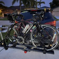 Pair of Hers and His Specialized Carbon Fiber Road Bikes