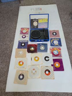 Portable Turntable with 45 RPM Vinyl Singles Collection