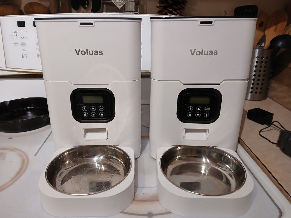 A Pair Of Automatic Dog And Or Cat Timed Feeders