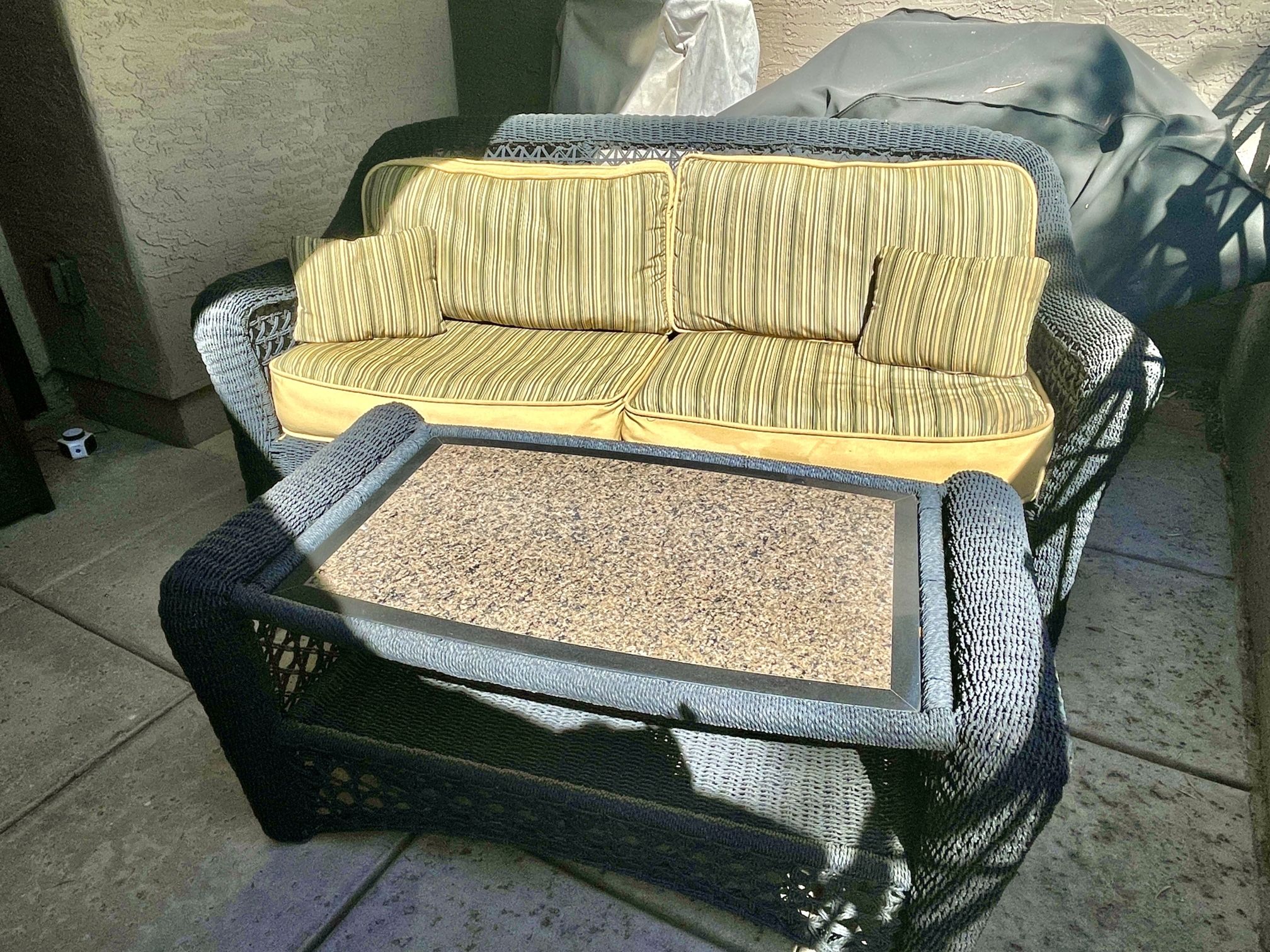 Black Wicker Couch and Table