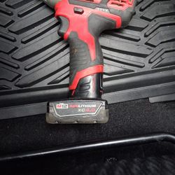 Milwaukee 1/4 Inch Impact Driver And Battery