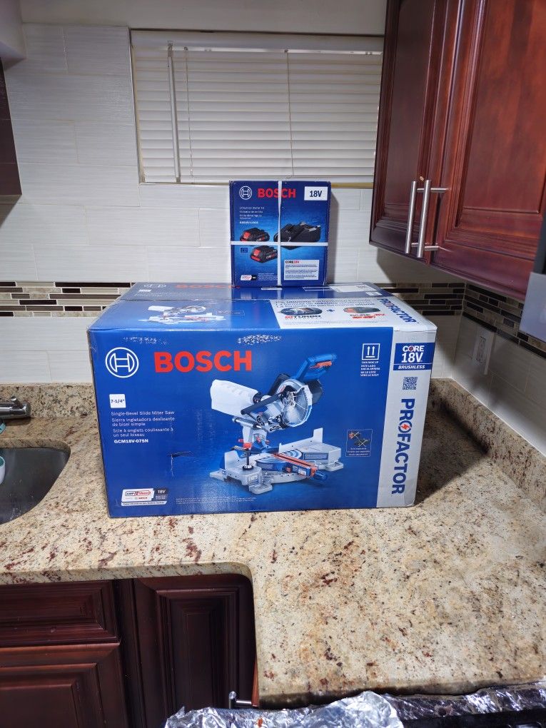 Bosch Profactor 7-1/4-in 18-volt Sliding Compound Cordless Miter Saw Model GCM18V-07SN with batterys and charger