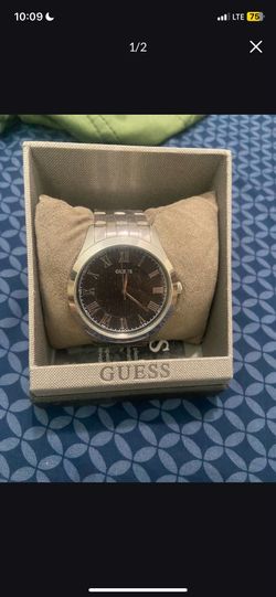 Silver guess watch battery dead has extra links