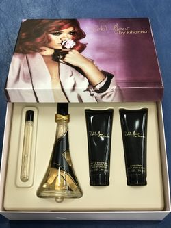 100 % authentic Rebl fleur by Rihanna. Large size gift set includes 3.4oz (100ml) perfume, body lotion, shower jel and mini perfume. Original brand n
