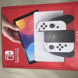 BRAND NEW NINTENDO SWITCH OLED (NEVER BEEN OPENED)