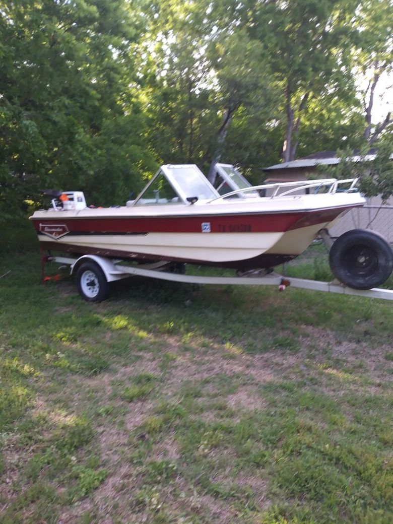 15 ft glastron fiberglass boat w/70 horse johnson outboard good boat runs good new tires and wheels on trailer