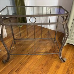 Metal table with glass top
