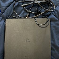 PlayStation 4 with power cord, HDMI cable & several games