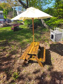 Price is from.. children's solid cedar picnic table and umbrella