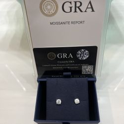 Luxury shine on a budget: 2 Carat Round-Cut GRA-Certified Moissanite studs that hit like diamonds.