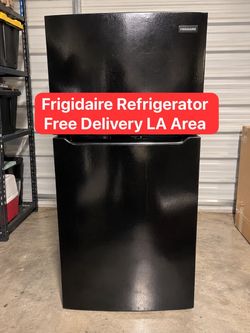 Kenmore or Frigidaire Refrigerator