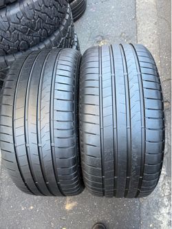 2 tires 285-35-22 Bridgestone 80% tread life $180 for 2 mounted and balanced