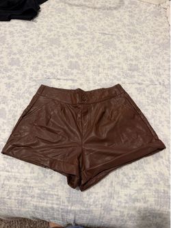 Brown mini faux leather shorts