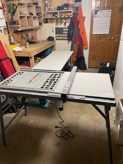 Makita table saw with stand and out table