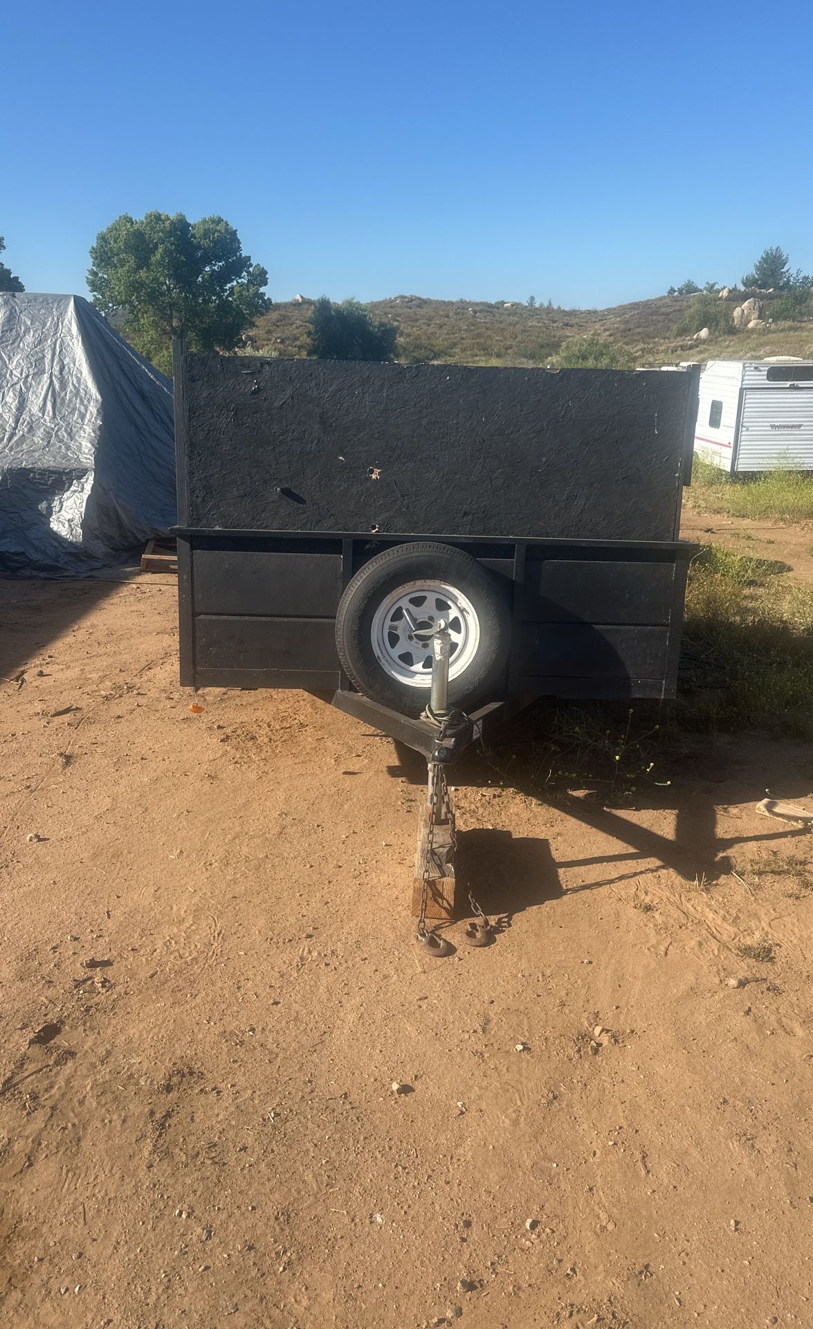 Used 6 X 10 Utility Trailer 4 Foot Side Walls three new tires, including the spare