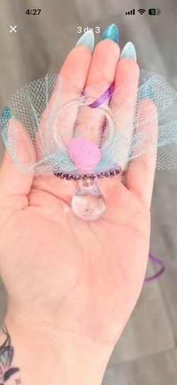 Baby shower pacifiers and diapers cake
