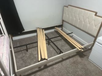 Queen sized bed with bed frame