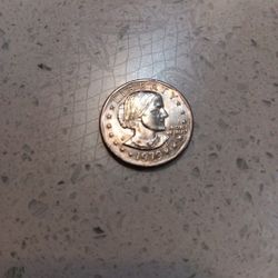 1979 Susan B Anthony Dollar p w/bow button error