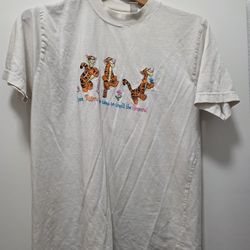 4 Disney shirts M. Tigger etc