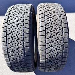 Pair (2) 235 65 18 Bridgestone Blizzak DM-V2 winter tires