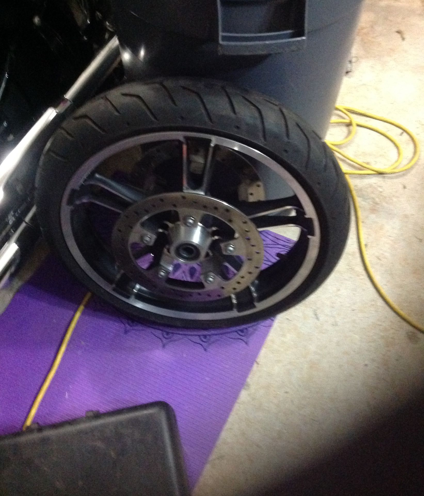 19" rim, tire and rotors for sale. $150