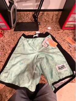 New boys swim trunks size 9/10
