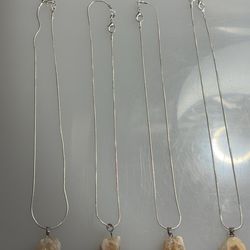 This is a handmade necklace featuring a natural citrine crystal pendant on a 925 silver chain