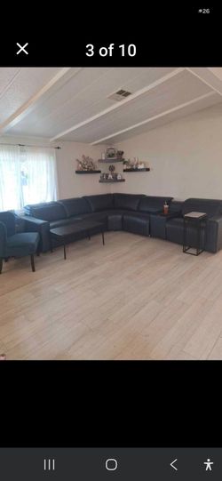 Leather sectional w/recliners