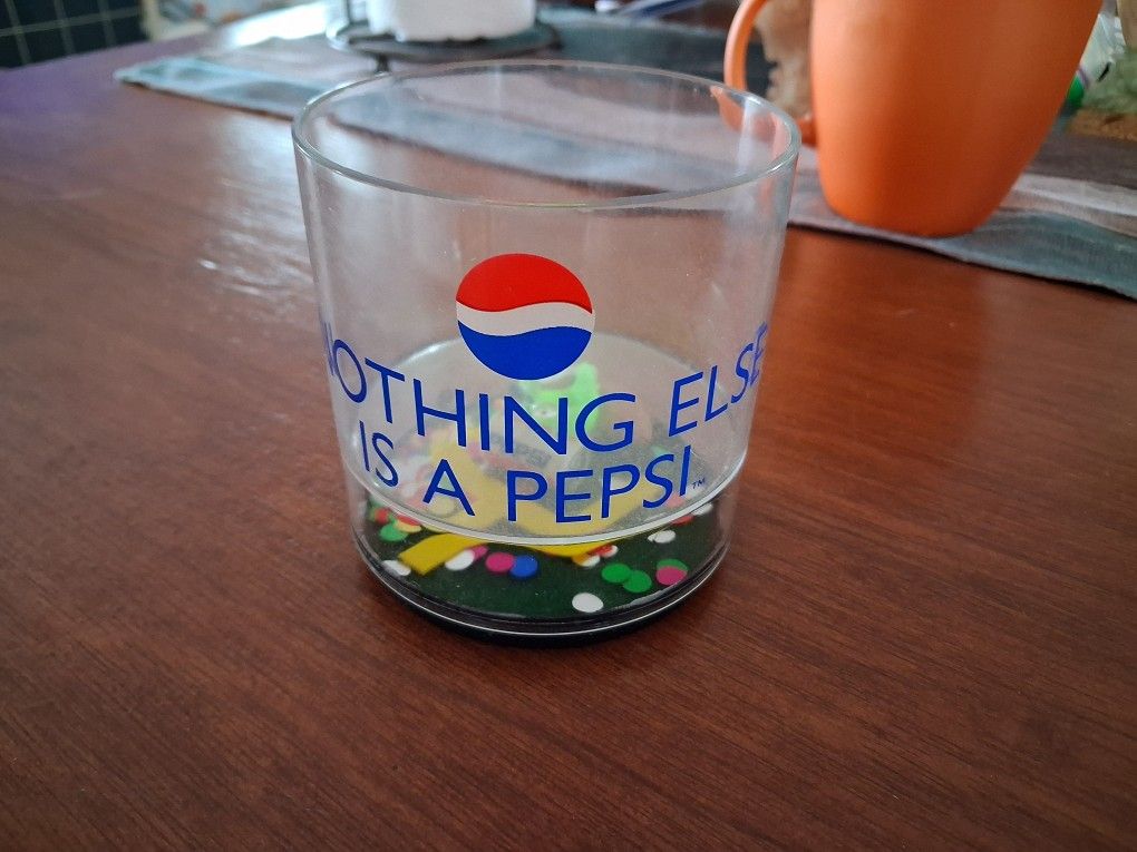 Vintage Pepsi-themed plastic cup featuring the slogan "Nothing Else Is A Pepsi".