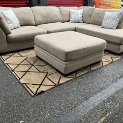 Sectional Couch with Ottoman!! Delivery Available 🚚!! Dimensions: 129” x 99” Length x 34” Height x 42” Depth - Ottoman Dimensions: 40” x 40” x 18” He